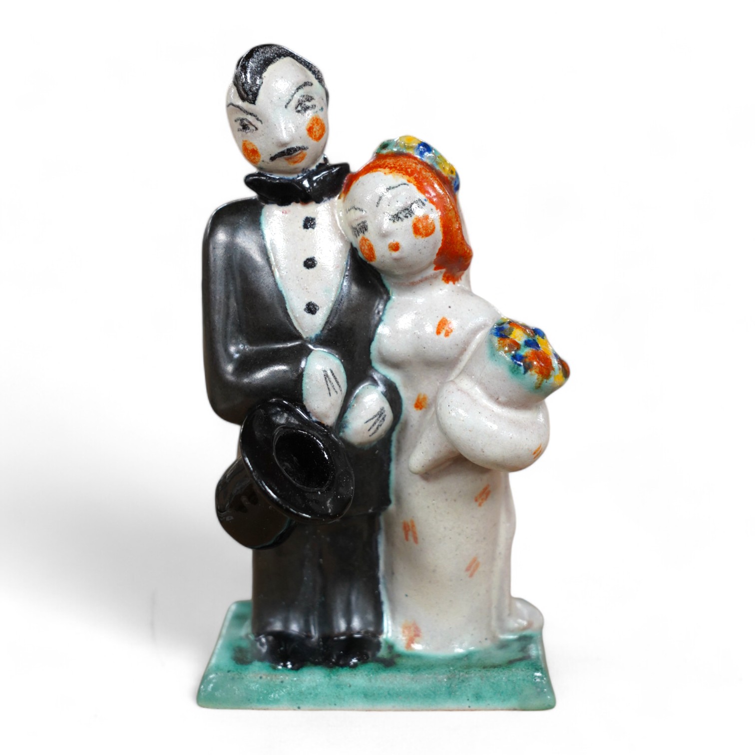 A Goldscheider stylised bride and groom, impressed 6239, 64 65, monogram H? 15.5cm high. Condition - good